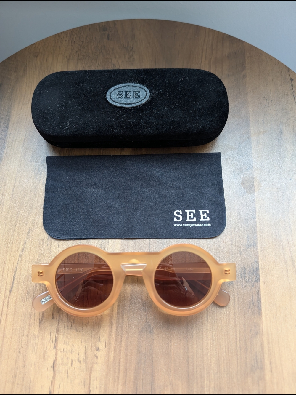 See Eyewear 1860 Round Sunglasses in Translucent Amber Brown Lens